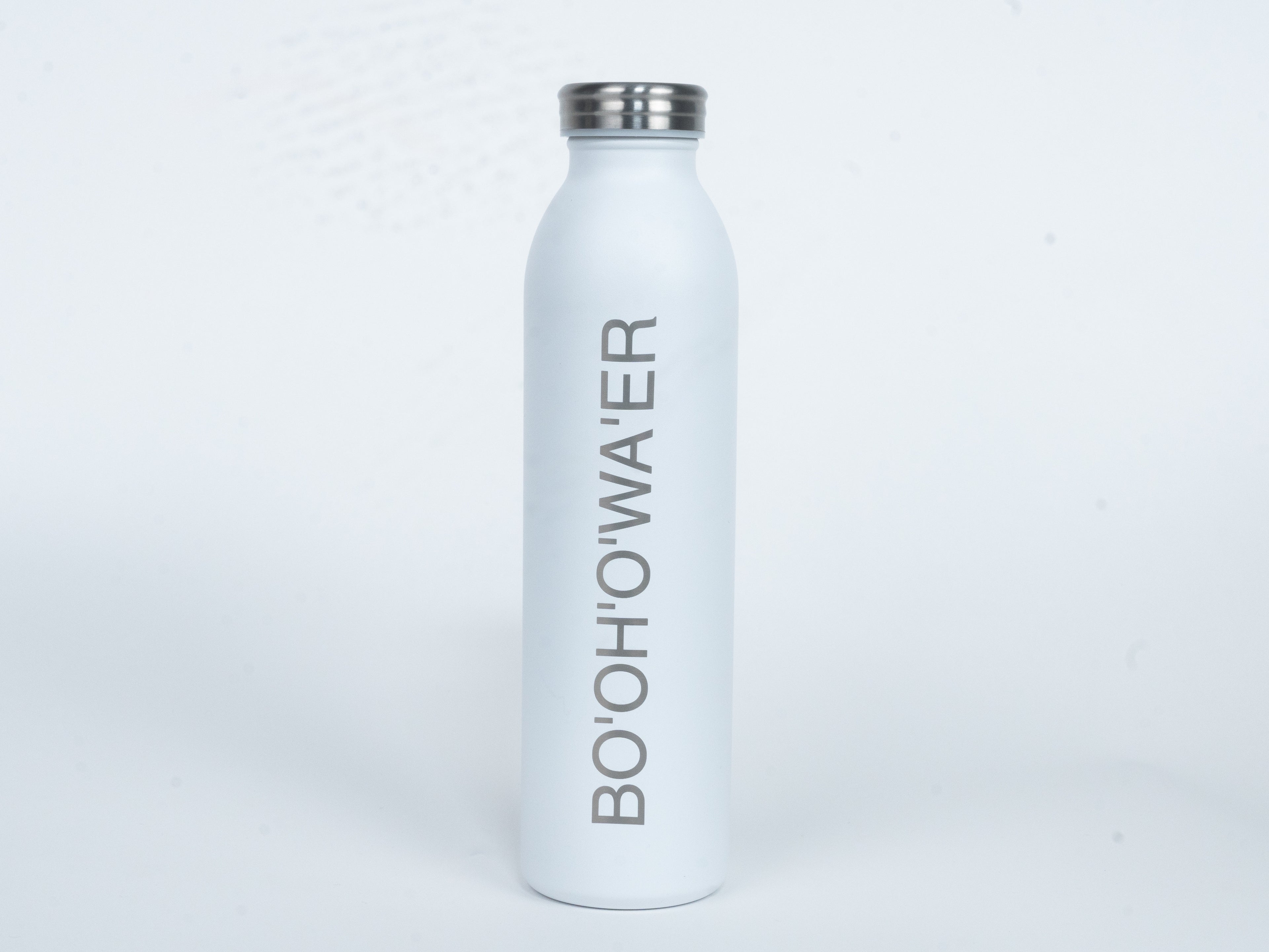 The front of the white bottle